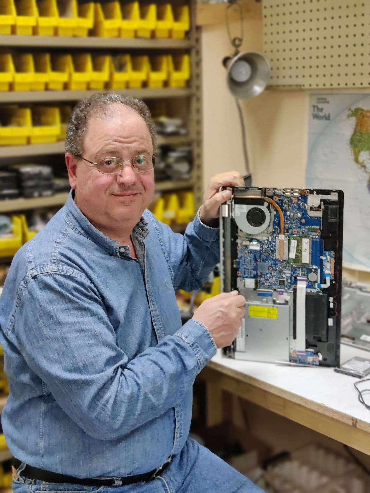 Steve at the Technoland workbench repairing a MacBook Air, Glendale CA